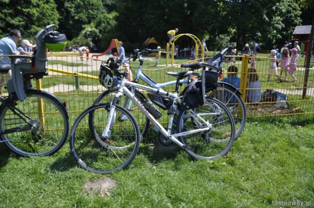 child on a bike, family on a bike, playground, active with a child